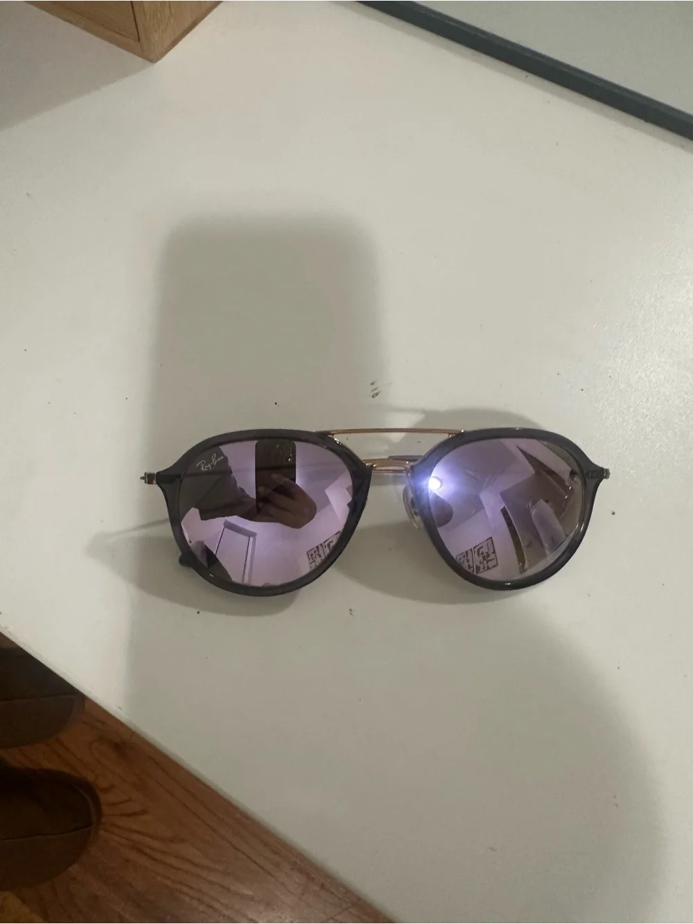 Ray-Ban Black Frame Sunglasses with Purple Mirrored Lenses